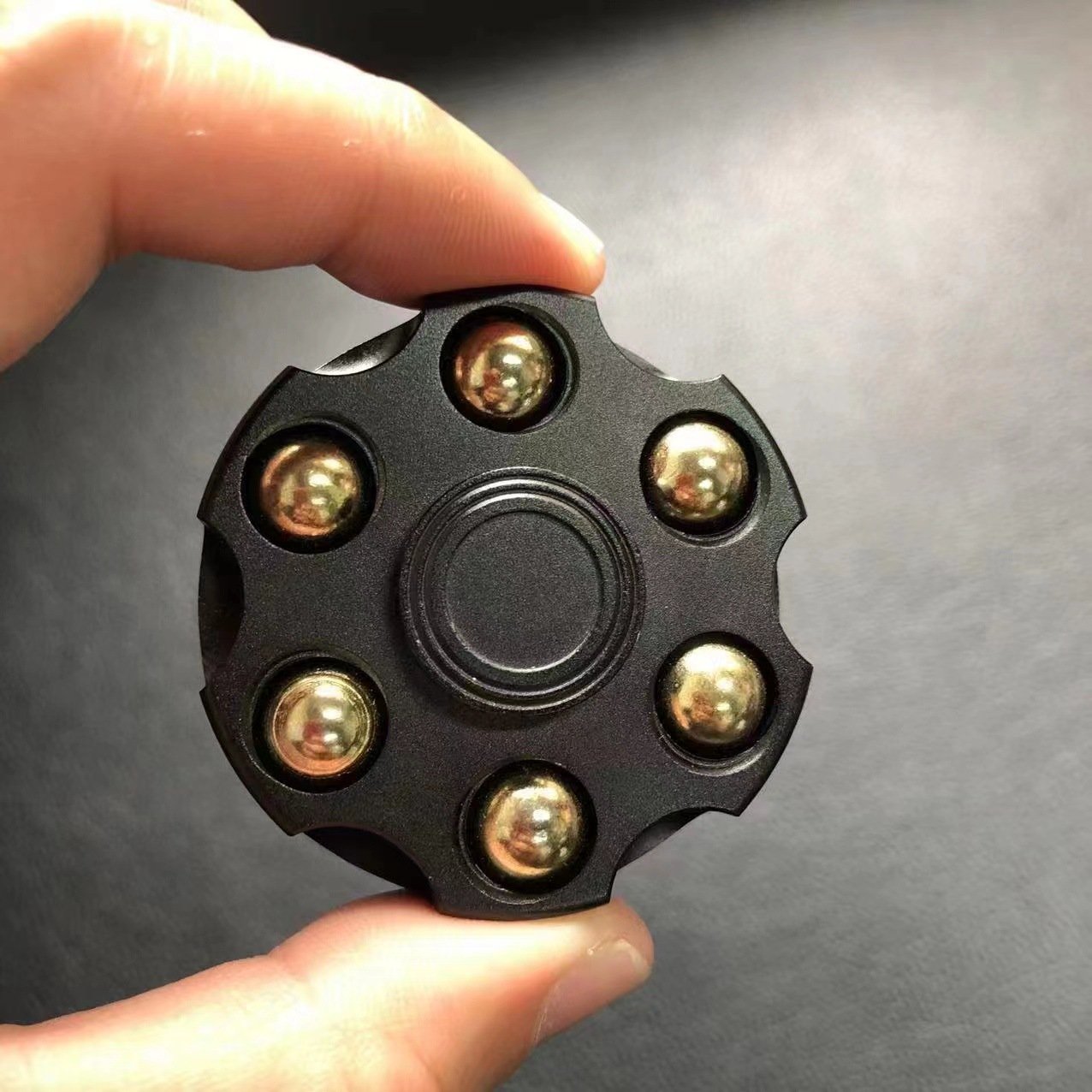 6b9aa654-9447-4e4d-b9f2-d7f735660371.jpg Unique Brass Gun Revolver Bullet Fidget Toy Spinner Copper Hand Spinners Detachable Rotating Sensory Finger Top For Kids Adults - Image 10