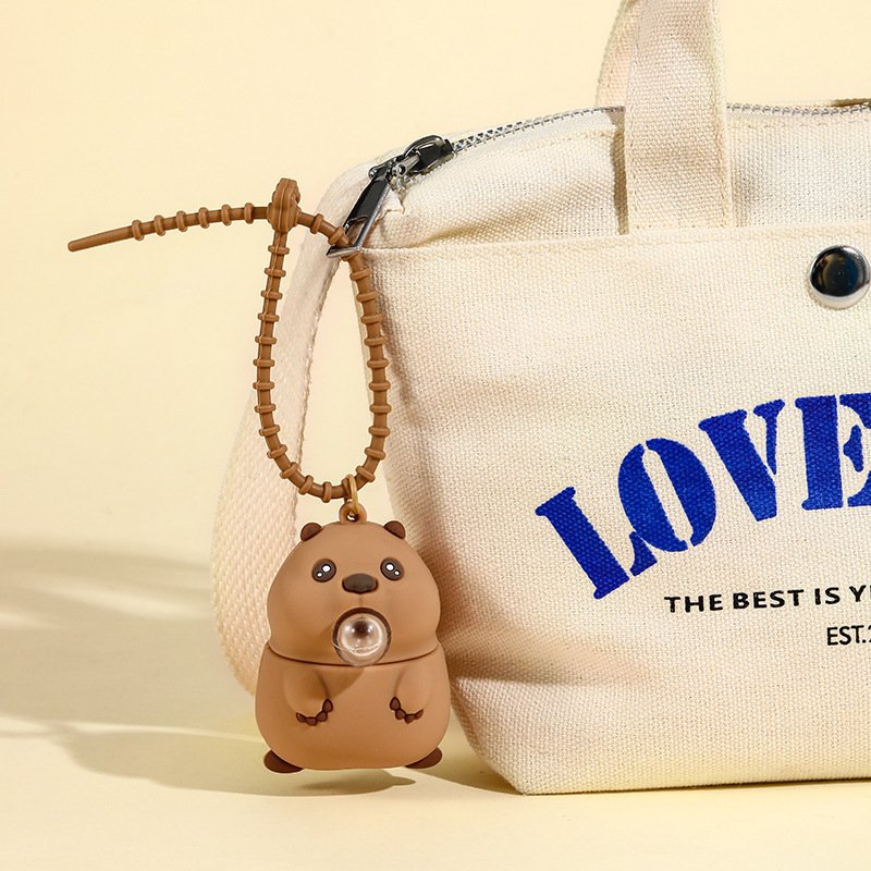91cd05cb-b56a-47ac-812b-4e454361f8c6.jpg Groundhog Squeezing Toy Bubble Blowing Car Keychain Pendant - Image 1